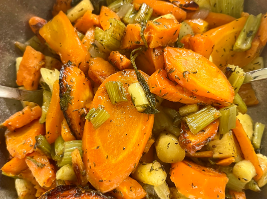 Veggies being tossed.